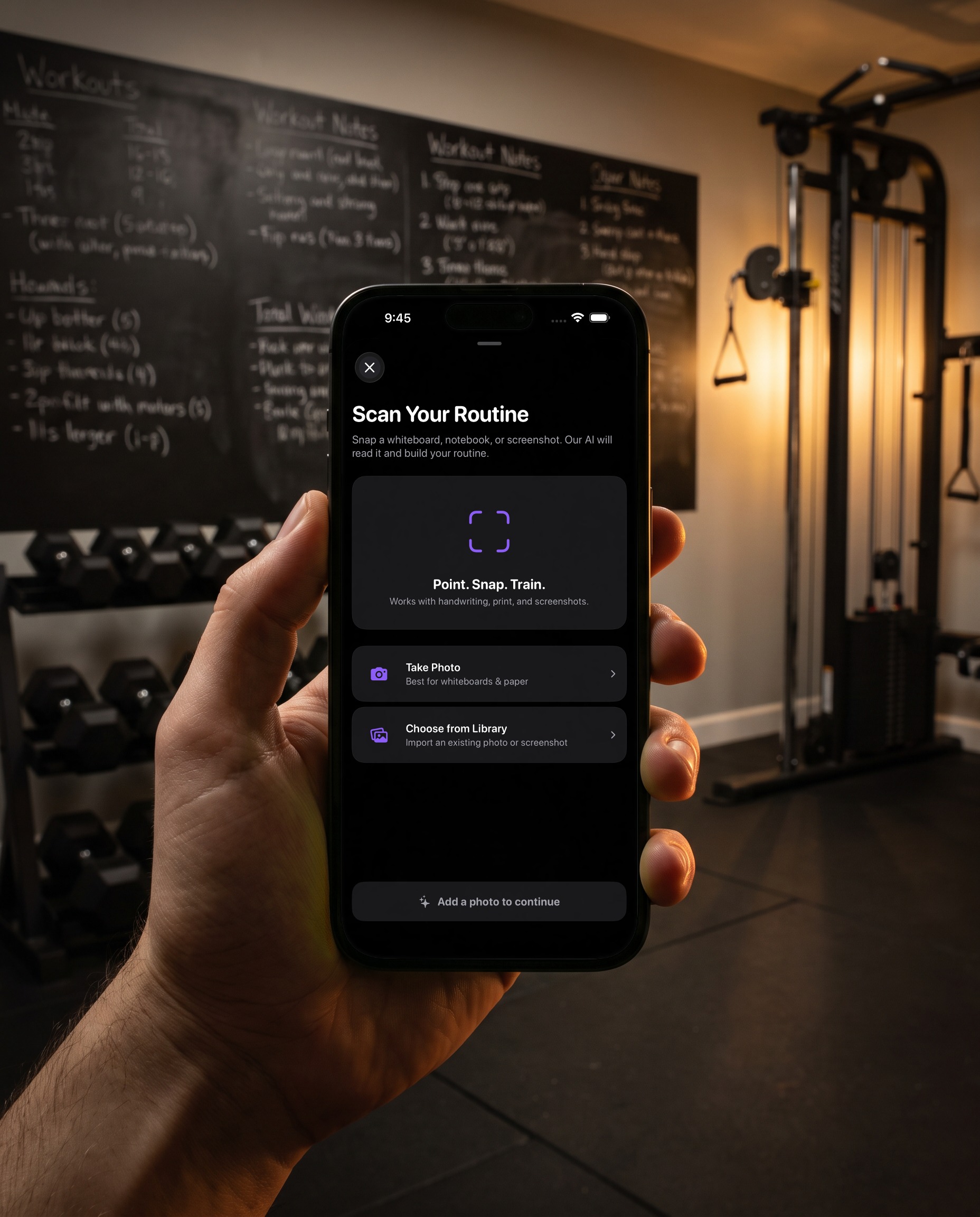 A hand holds the phone in front of a gym whiteboard with a handwritten plan. The Reps Scan Your Routine screen offers Take Photo and Choose from Library
